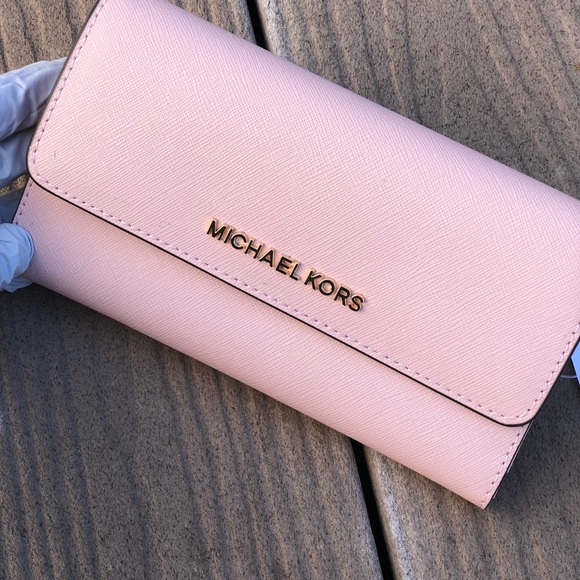 Michael Kors Handbags - NWT Michael Kors jet set carryall wallet reserved